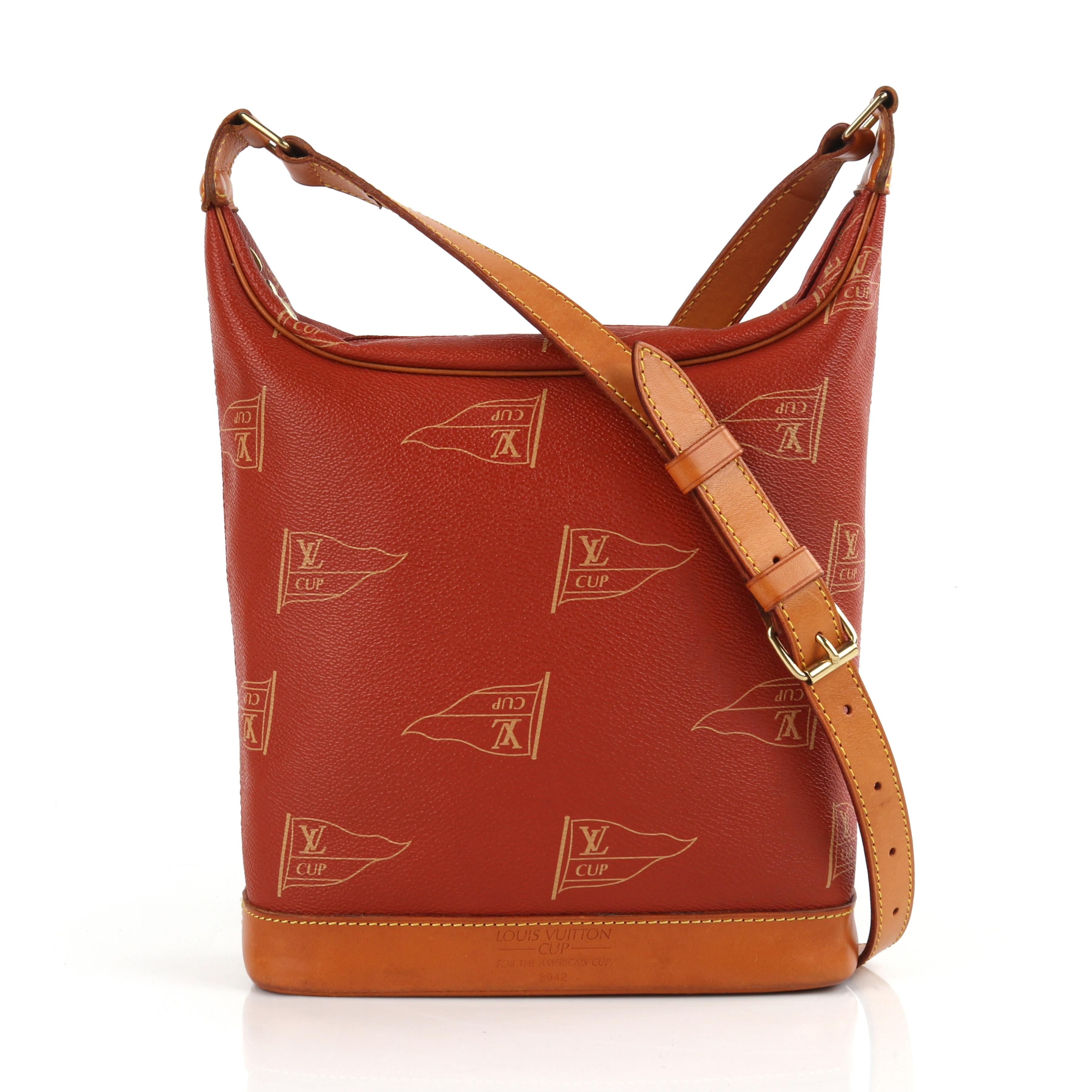 LOUIS VUITTON Limited Edition 1994 “Cup Le Touquet” Red Tan Shoulder Crossbody
 
Brand / Manufacturer: Louis Vuitton
Year: 1994
Manufacturer Style Name: Cup Le Touquet Shoulder Bag
Color(s): Shades of red, tan, and gold
Lined: Yes 
Unmarked Fabric