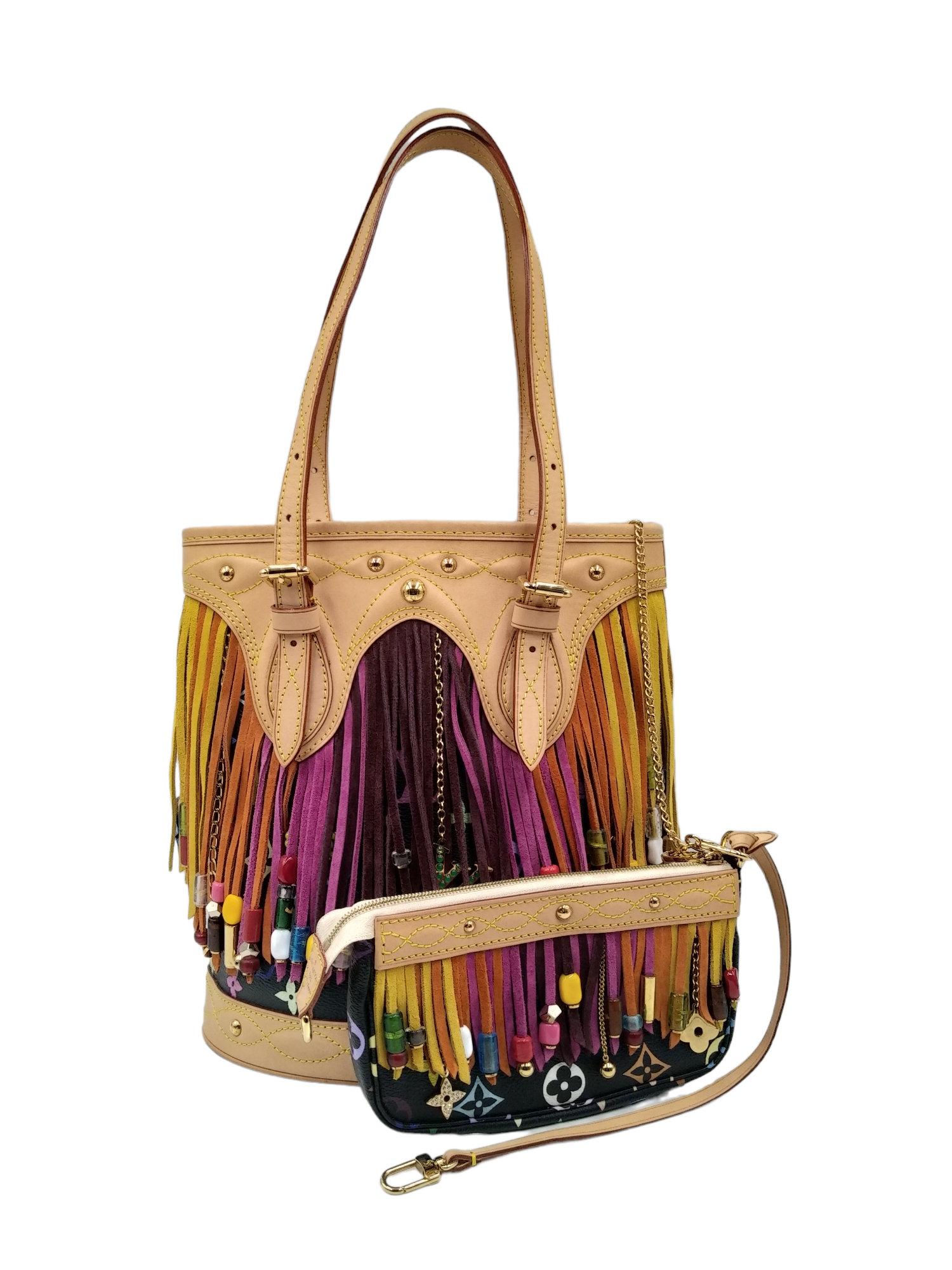 Louis Vuitton Limited Edition Black Monogram Multicolor Fringe Bucket Bag with Accessories Pouch, 2006
- 100% authentic Louis Vuitton 
- Monogram coated canvas with leather trim and suede fringe
- Double flat adjustable leather shoulder straps
- 