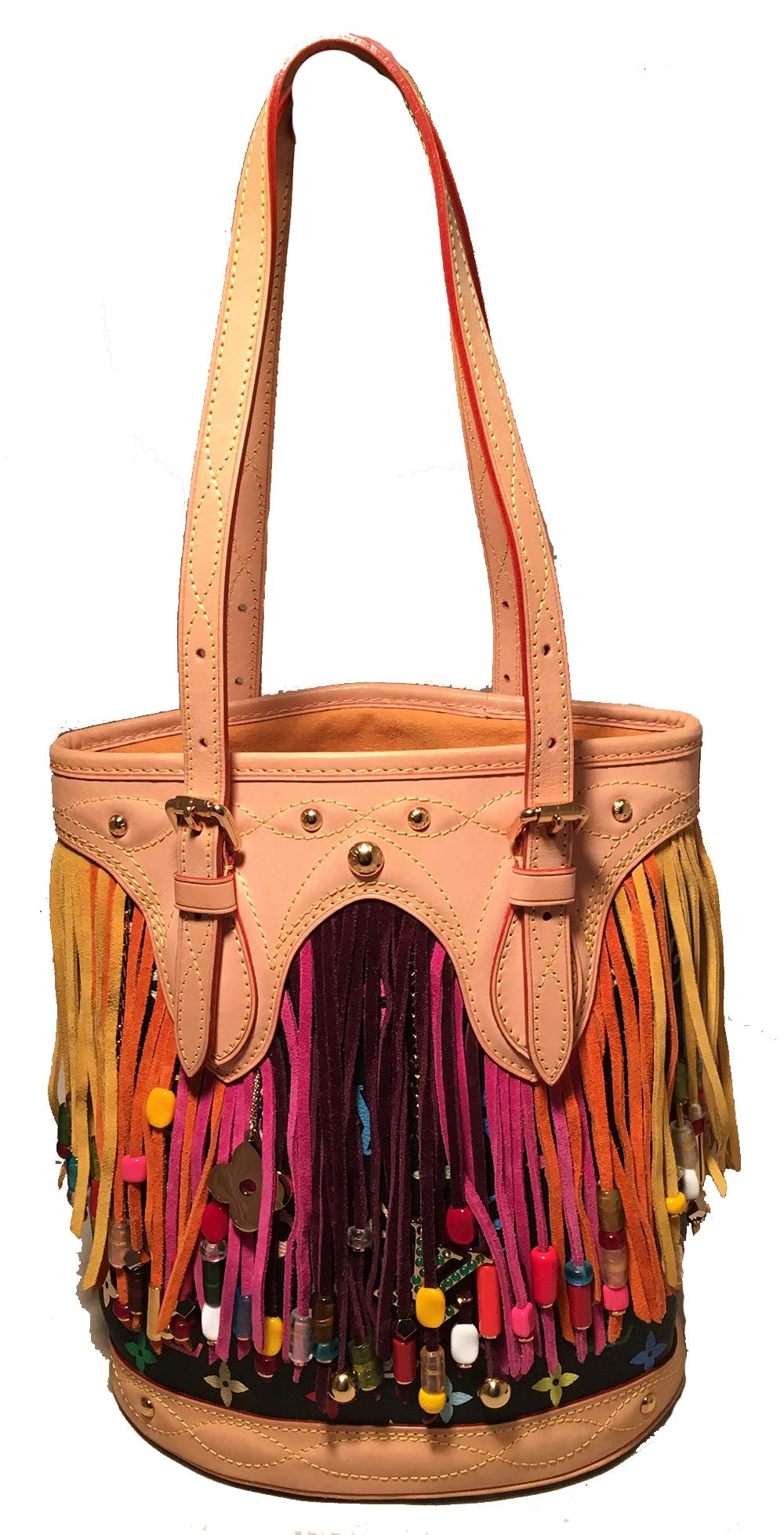 Louis Vuitton Limited Edition Black Monogram Multicolor Fringe Bucket Bag with Pouch in excellent condition. Black multicolor monogram canvas trimmed with tan leather and gold hardware and multicolor suede fringe with charm details. Interior lined