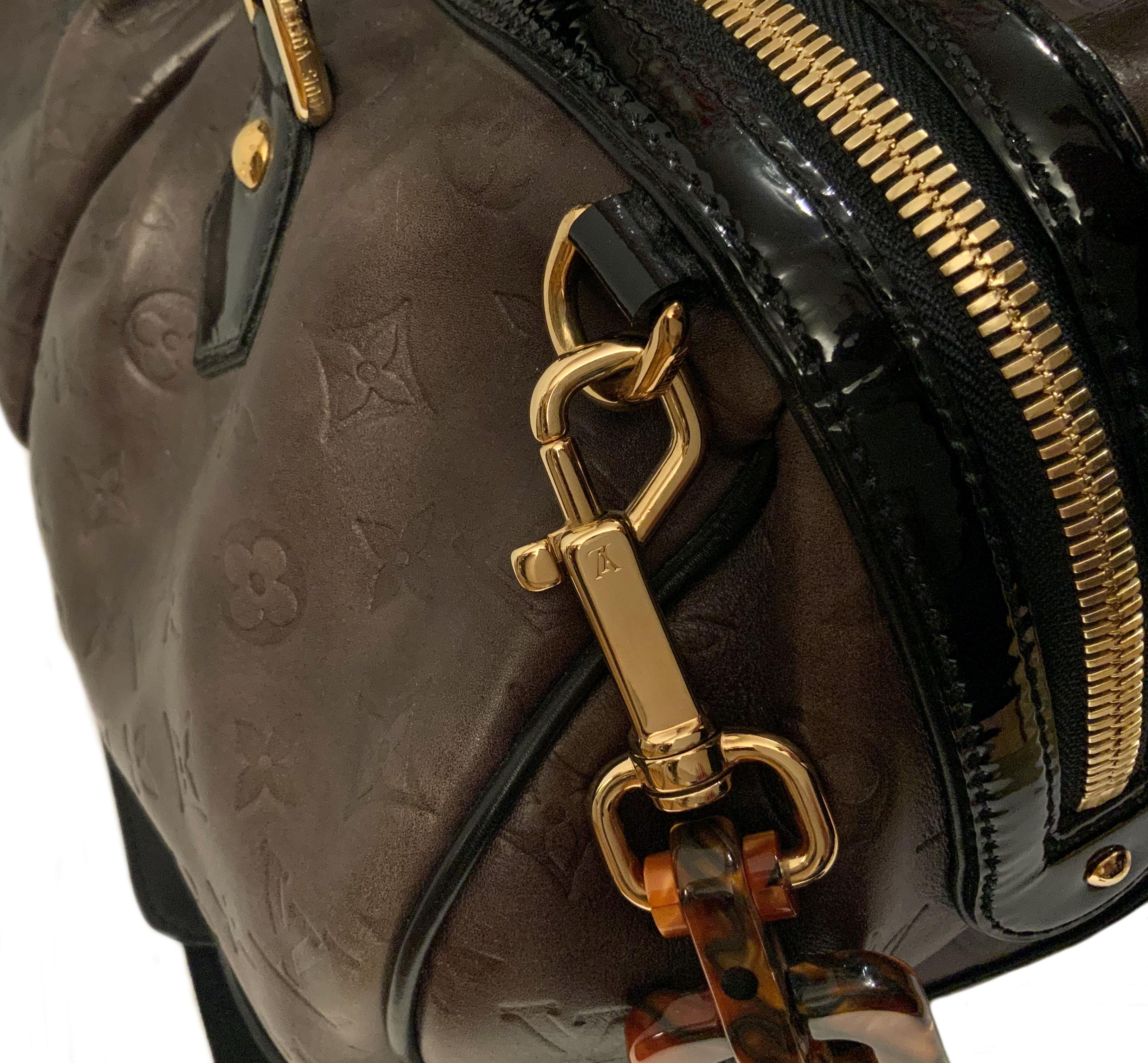 This pre-owned beautiful Limited Edition brown embossed Monogram Calfskin Bag from the house of Louis Vuitton is named after its creator, the artist Stephen Sprouse. 
Produced in very limited quantities and no longer available, the Stephen bag is
