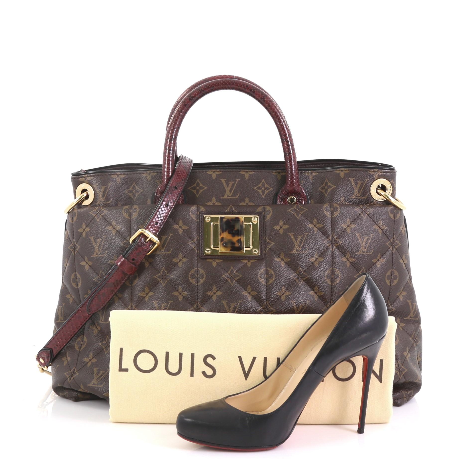 This Louis Vuitton Limited Edition Exotique Handbag Monogram Etoile GM, crafted from soft padded quilted brown monogram etoile coated canvas and genuine purple python, features genuine python handles, oversized tortoise resin twist lock, and
