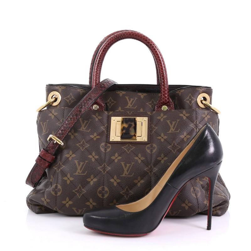 This Louis Vuitton Limited Edition Exotique Handbag Monogram Etoile MM, crafted from soft padded quilted brown monogram etoile leather, features genuine python handles and gold-tone hardware. Its tortoise resin twist lock closure opens to a brown