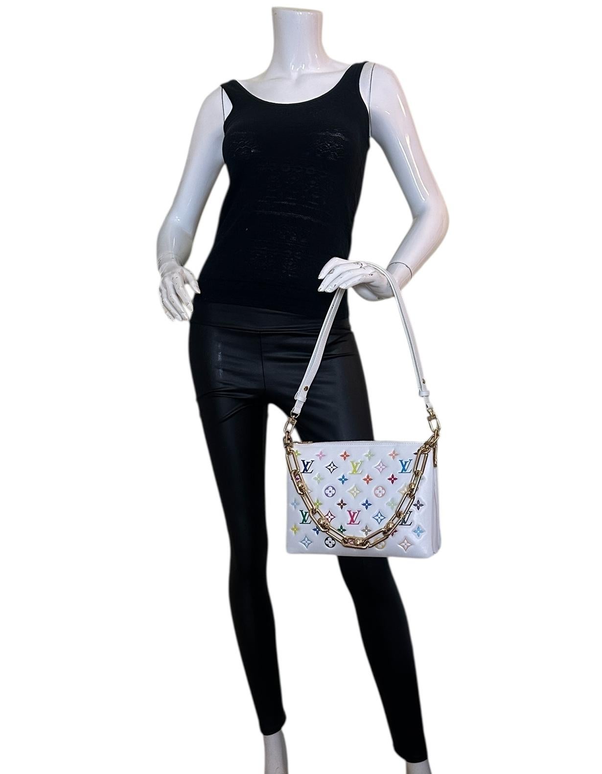 Louis Vuitton Limited Edition LV x TM Murakami Multicolor Coussin PM. Features removable shoulder and chain strap. 

Made In: Italy
Color: Multicolored
Hardware: Goldtone hardware
Materials: Monogram-embossed puffy lambskin with smooth