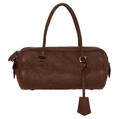 Louis Vuitton Limited Edition Marron Monogram Leather Revelation Neo Papillon PM