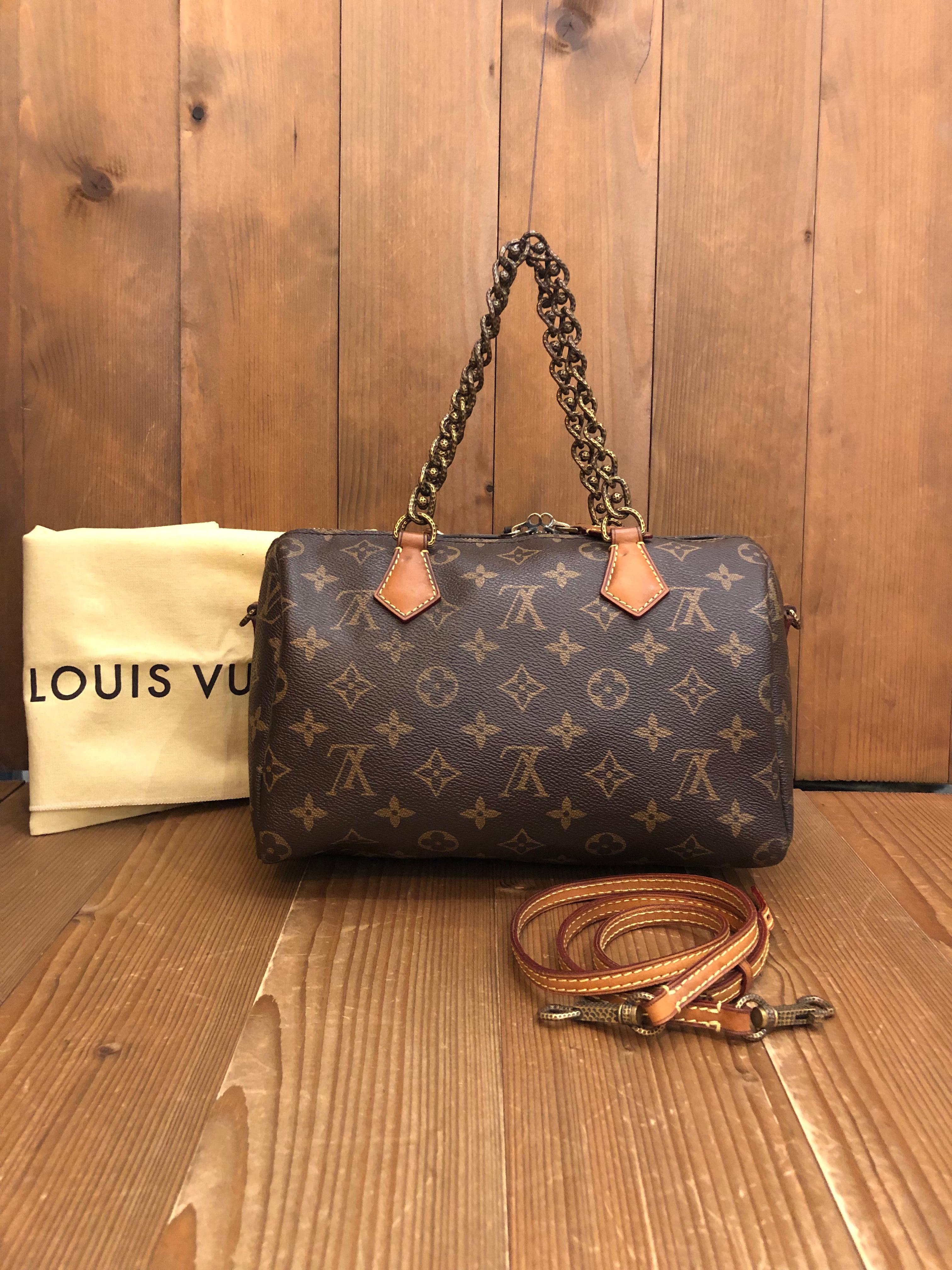 For Fall/Winter 2013-2014, Louis Vuitton focused on using dramatic materials and reimaging shapes. The classic Louis Vuitton Speedy has been updated with hammered beaded chain handles. Made in Spain in 2013 with date-code CA2153. Measures