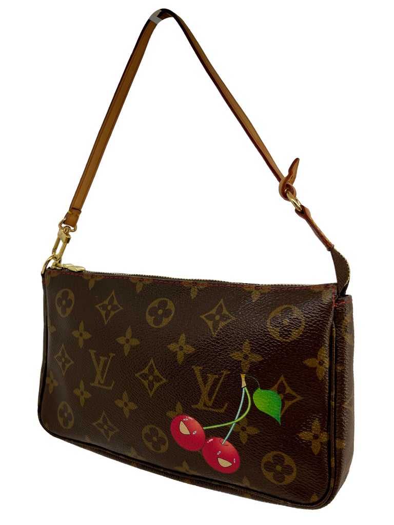 Louis Vuitton Limited Edition Monogram Cerises Murkami Pochette Bag, 2005. This incredibly rare and highly sought after piece of Louis Vuitton history became a worldwide phenomenon when Japanese artist Takashi Murakami teamed up with the brand and