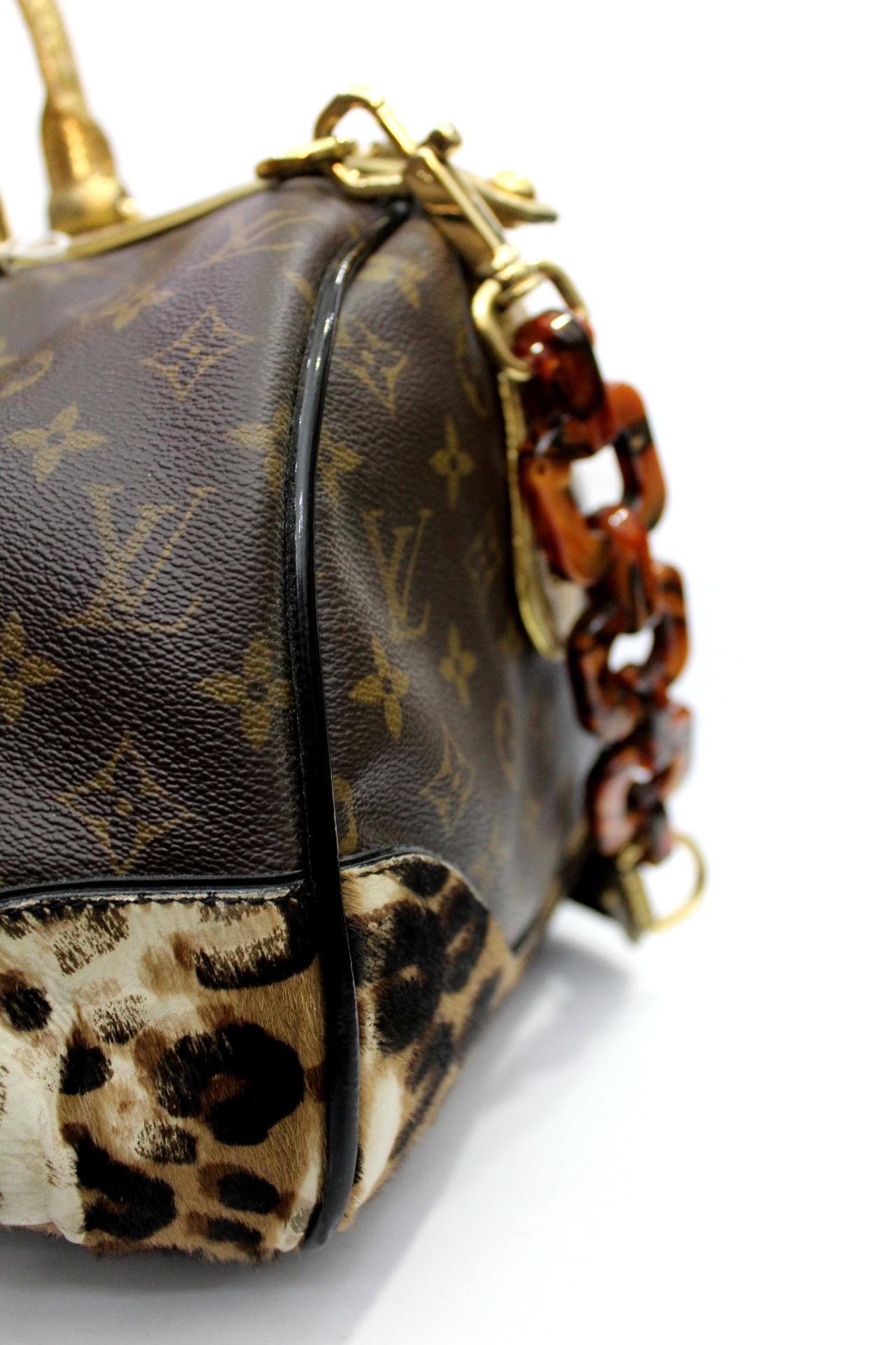 The stunning Monogram Leopard Stephen bag is named after its creator, artist Stephen Sprouse. Produced in very limited quantities and no longer available, the Stephen bag is considered by many to be the pinnacle of the many collaborations between