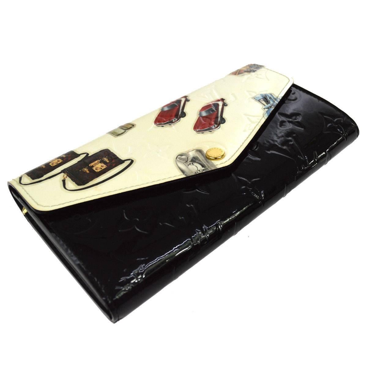 Louis Vuitton Limited Edition Monogram Vernis Logo Black Ivory Clutch Wallet

Monogram Vernis
Gold tone hardware 
Leather lining 
Snap button closure
Interior features card slots, bill and coin compartments
Date code present
Made in France
Measures