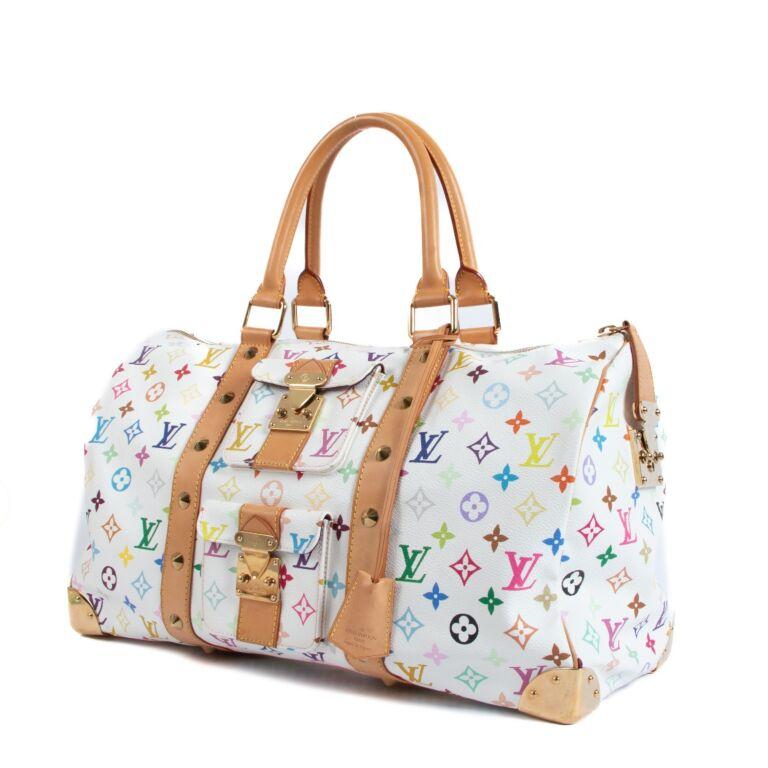 From our private collection, we offer this collectors item; the Louis Vuitton multicolor monogram 45 keepall travel bag. The bag comes with its original keys, clochette and dustbag.
The collaboration with Takashi Murakami  was the most iconic