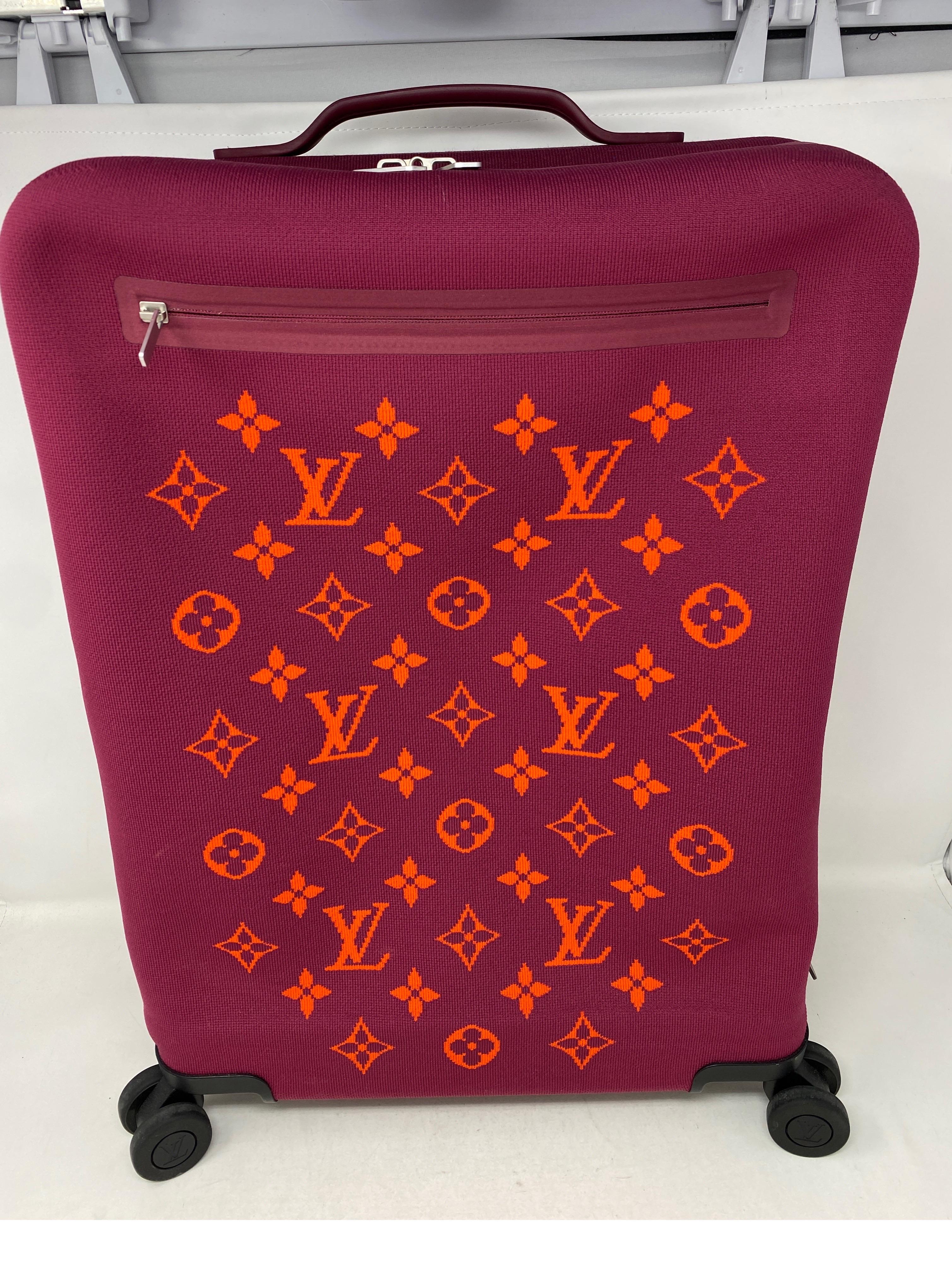Louis Vuitton Purple and Orange Limited Edition Roller Suitcase. Cool design and cotton jersey material on suitcase. Excellent like new condition. Collector's piece. Carry on size. Travel in style. Guaranteed authentic. 