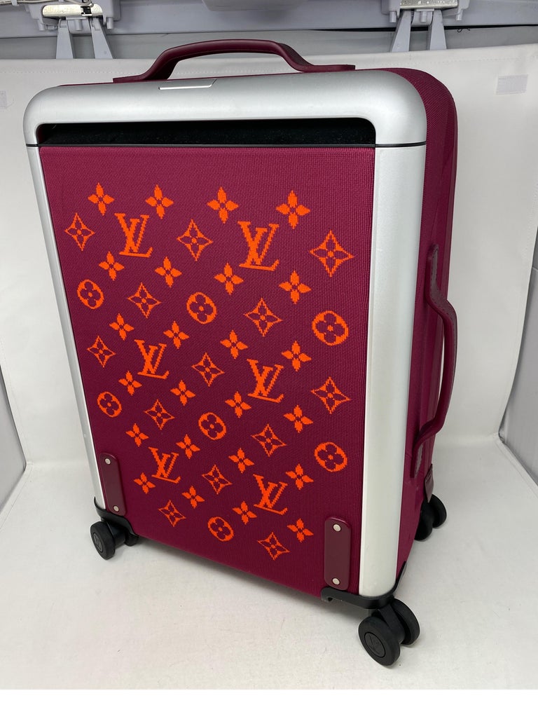 red louis vuitton luggage