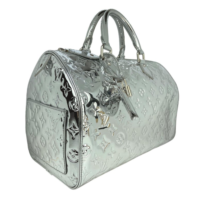 Louis Vuitton Rare Silver Speedy 30 · INTO