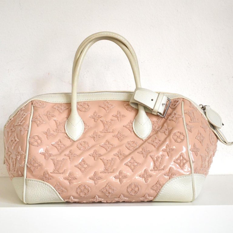 Louis Vuitton Limited edition Speedy Rose monogram Bouclettes spring/summer 2012
- 100% authentic Louis Vuitton
- Rose colored soft patent lambskin with delicate matte Monogram pattern embroidery and white calf leather trim
- Double rolled leather