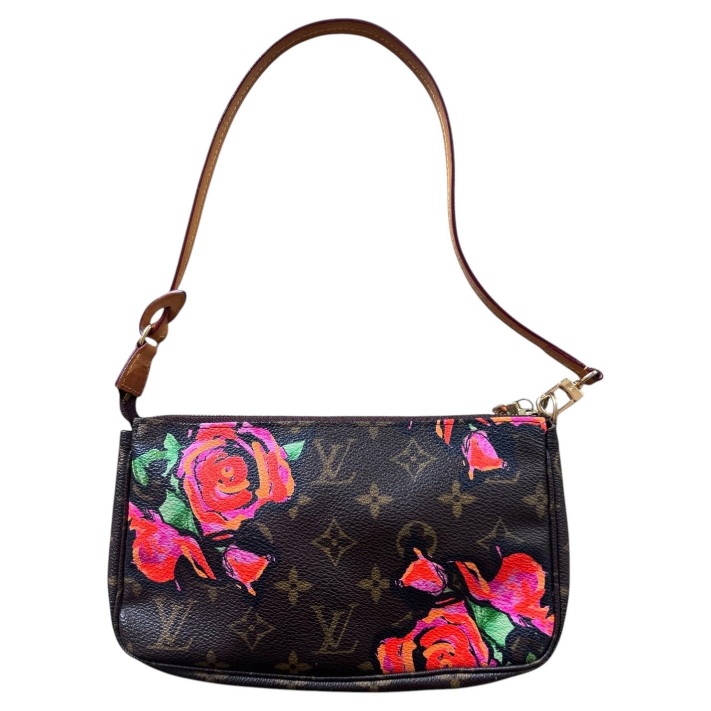 Who owns the Marc Jacobs brand?