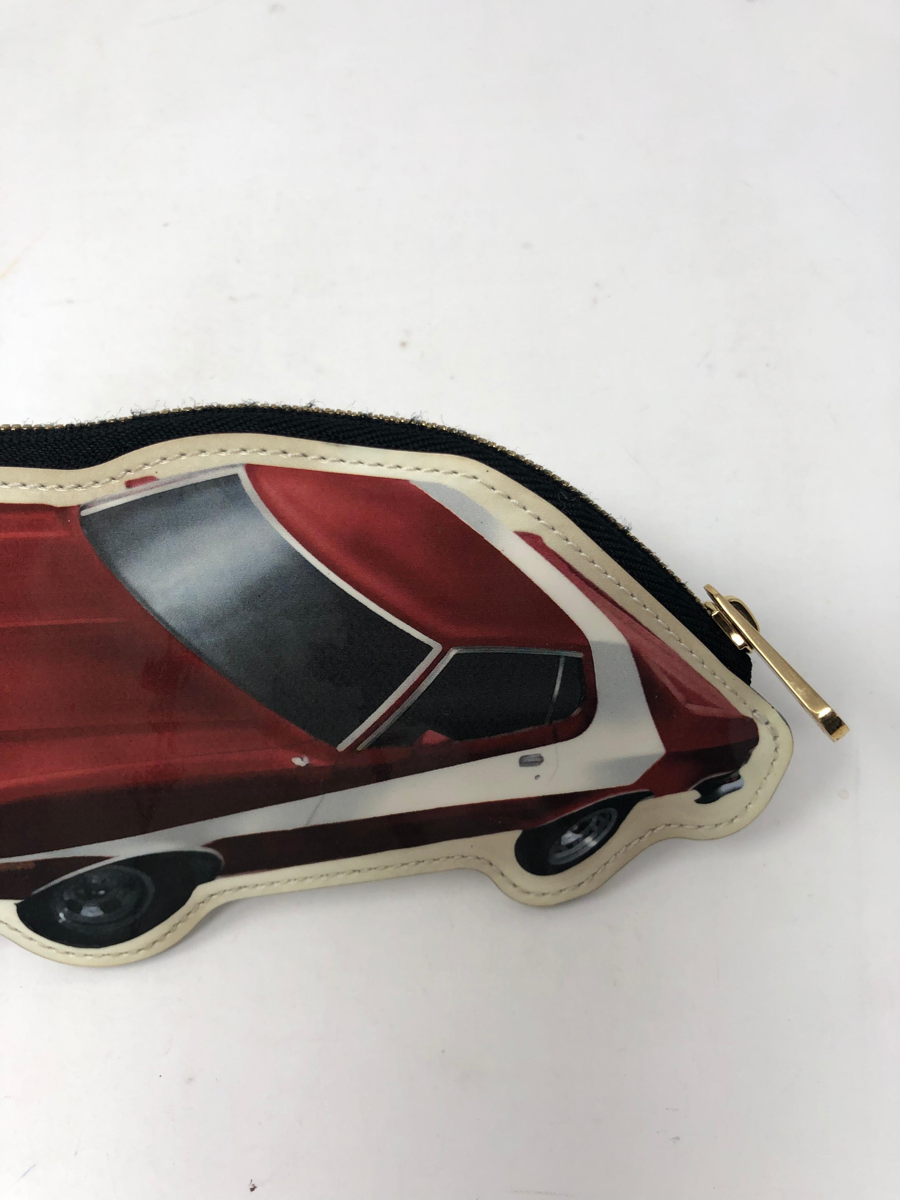 Louis Vuitton Limited Edition Stickers Car Coin Purse from the World Tour Collection. Includes dust cover and box. Guaranteed authentic. 