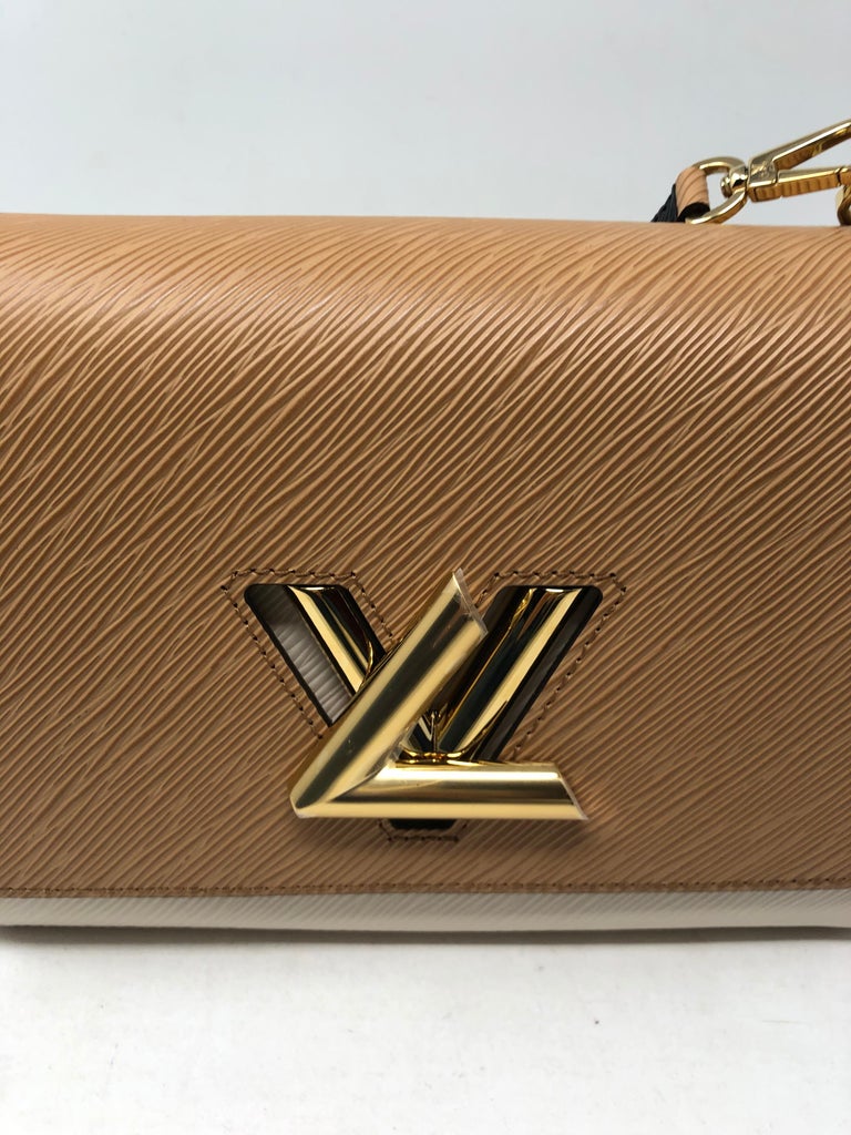 Louis Vuitton Epi Leather Whipstitch Twist Shoulder Bag (SHF-18832) – LuxeDH