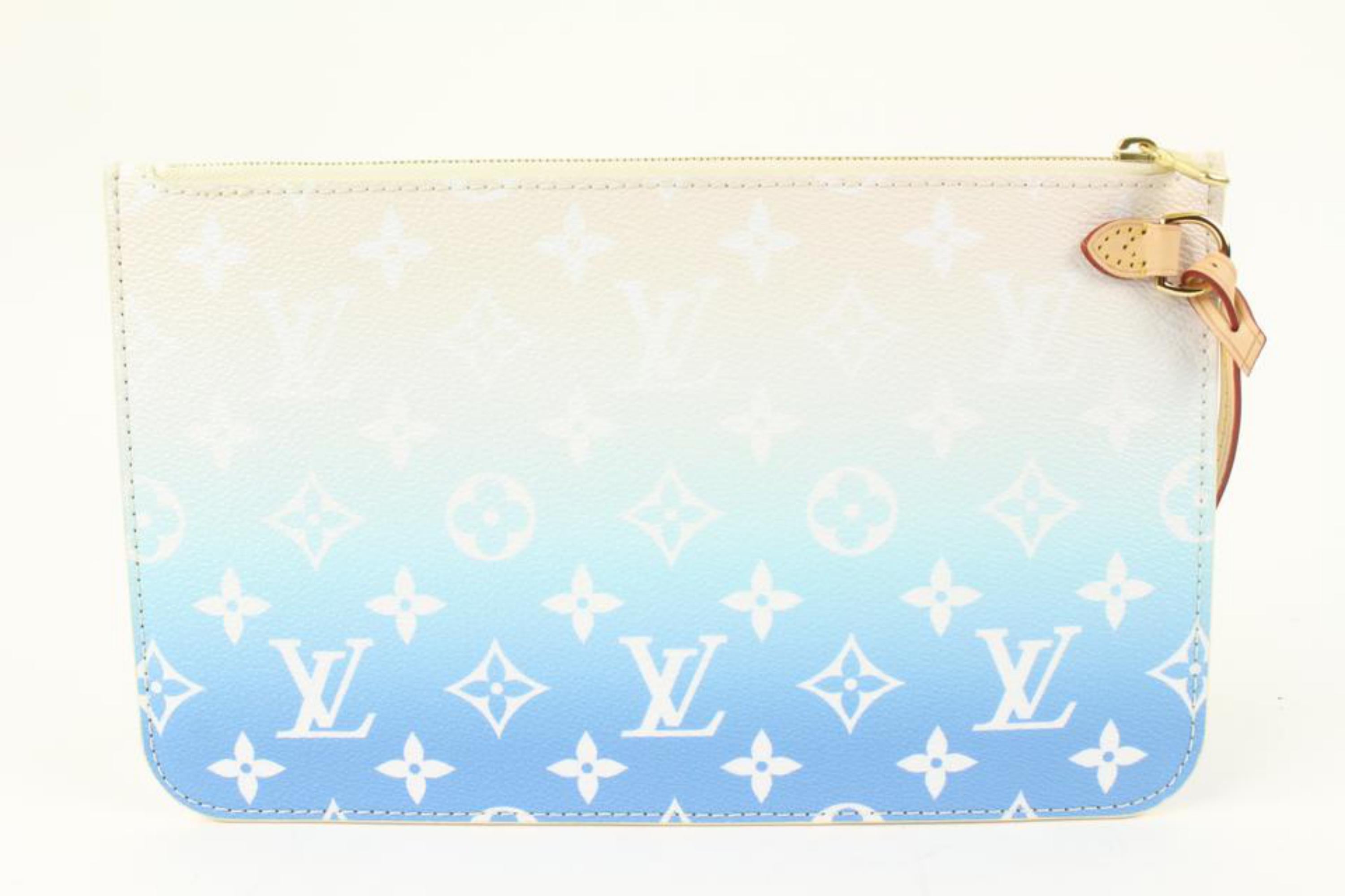 Louis Vuitton Limited Monogram Blue By the Pool Neverfull Pochette Wristlet 21lk311s
Date Code/Serial Number: RFID Chip
Made In: France
Measurements: Length:  9.75