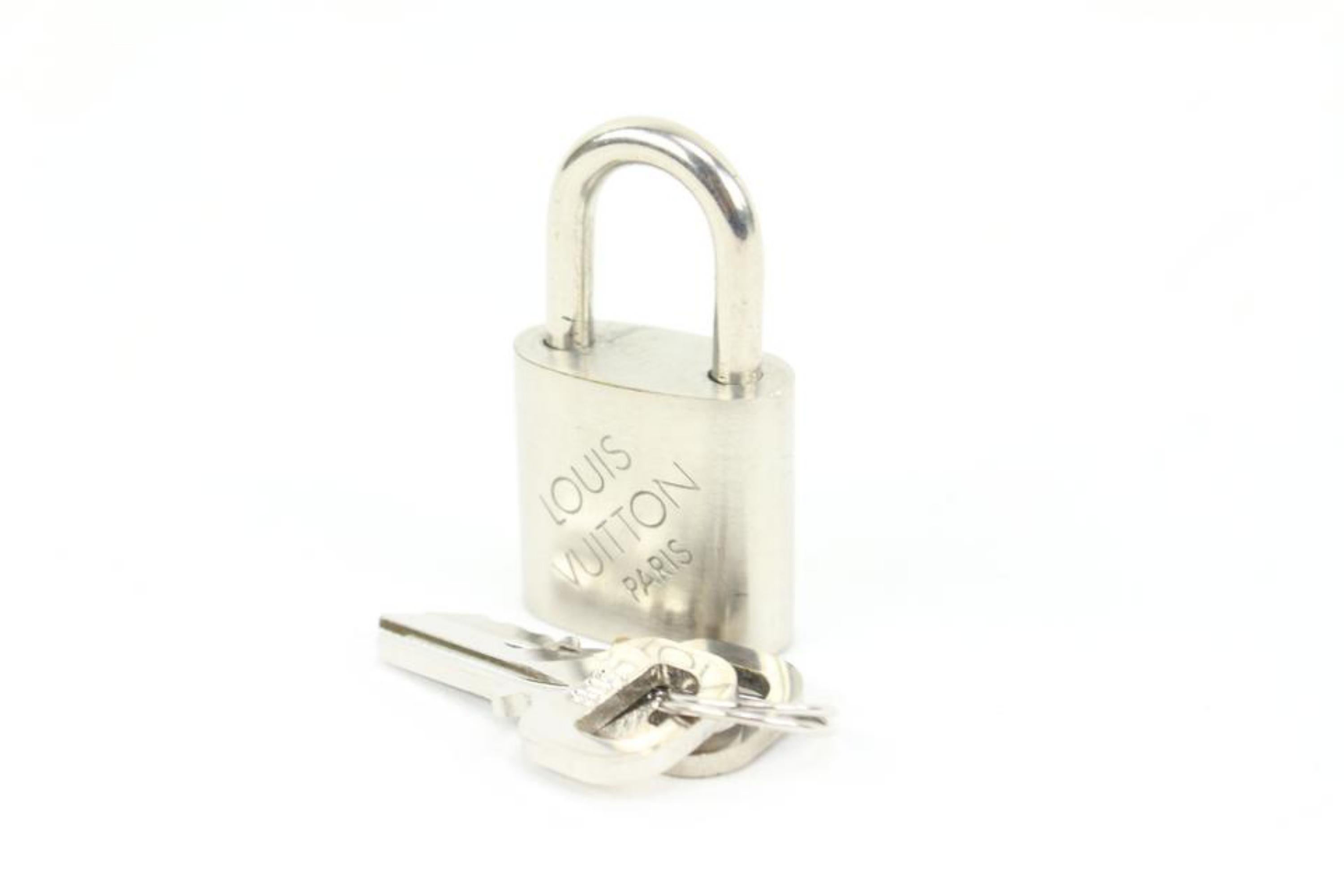 Louis Vuitton Limited Silver Padlock and Keys Set Lock Bag Charm Cadena 2LV34S
Made In: France
Measurements: Length:  1.8
