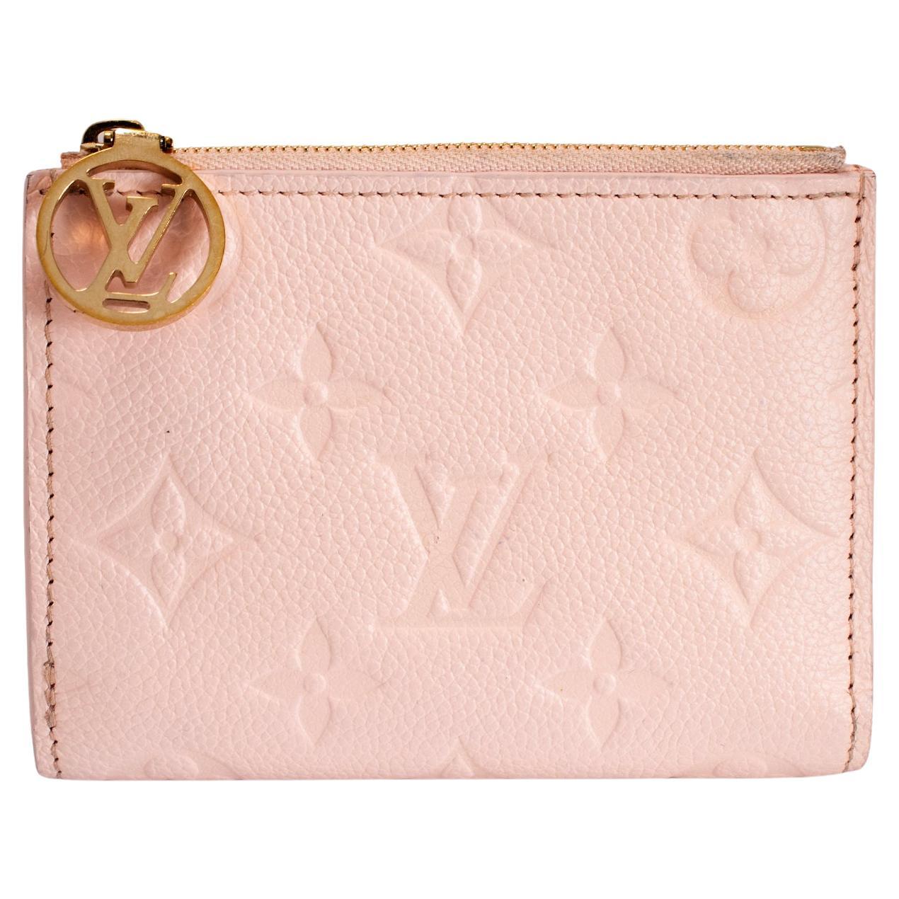 Portafoglio Louis Vuitton Lisa Monogram Empreinte in pelle opalina rosa con finiture dorate