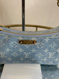 Louis Vuitton Liv Monogram Denim clutch Bag
