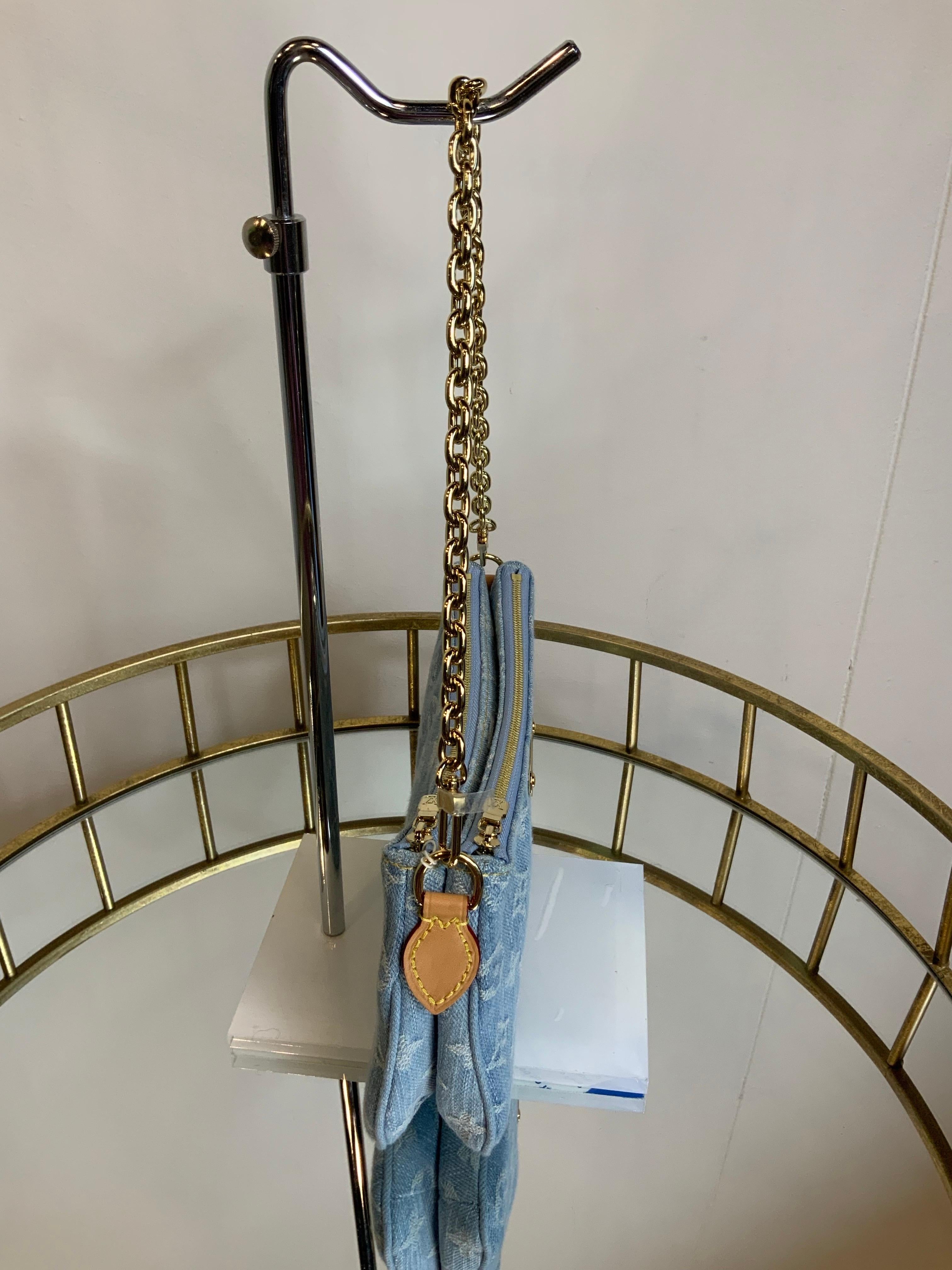Louis Vuitton Liv Monogram Denim clutch Bag In New Condition In Carnate, IT