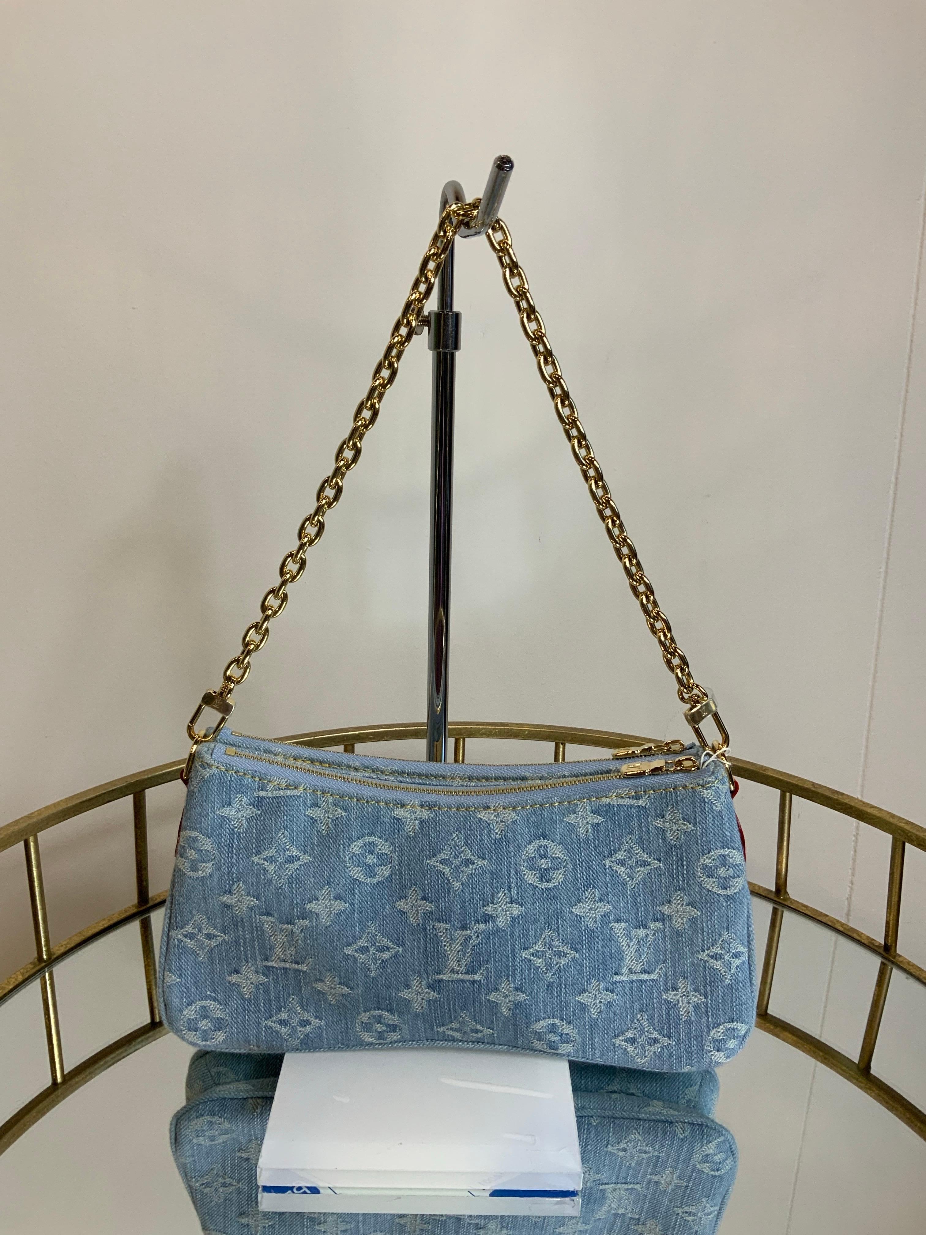 Women's or Men's Louis Vuitton Liv Monogram Denim clutch Bag