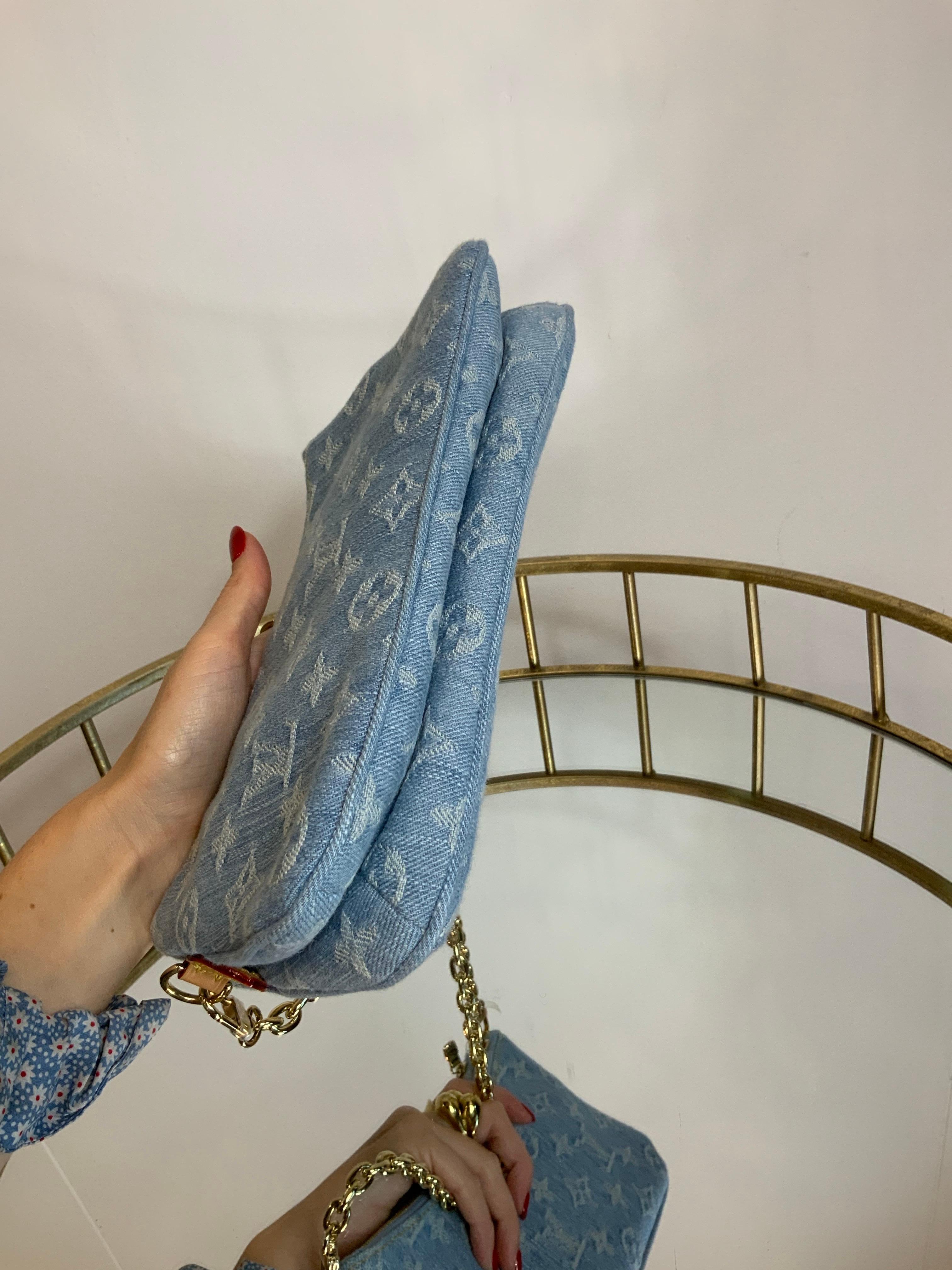 Louis Vuitton Liv Monogram Denim clutch Bag 1
