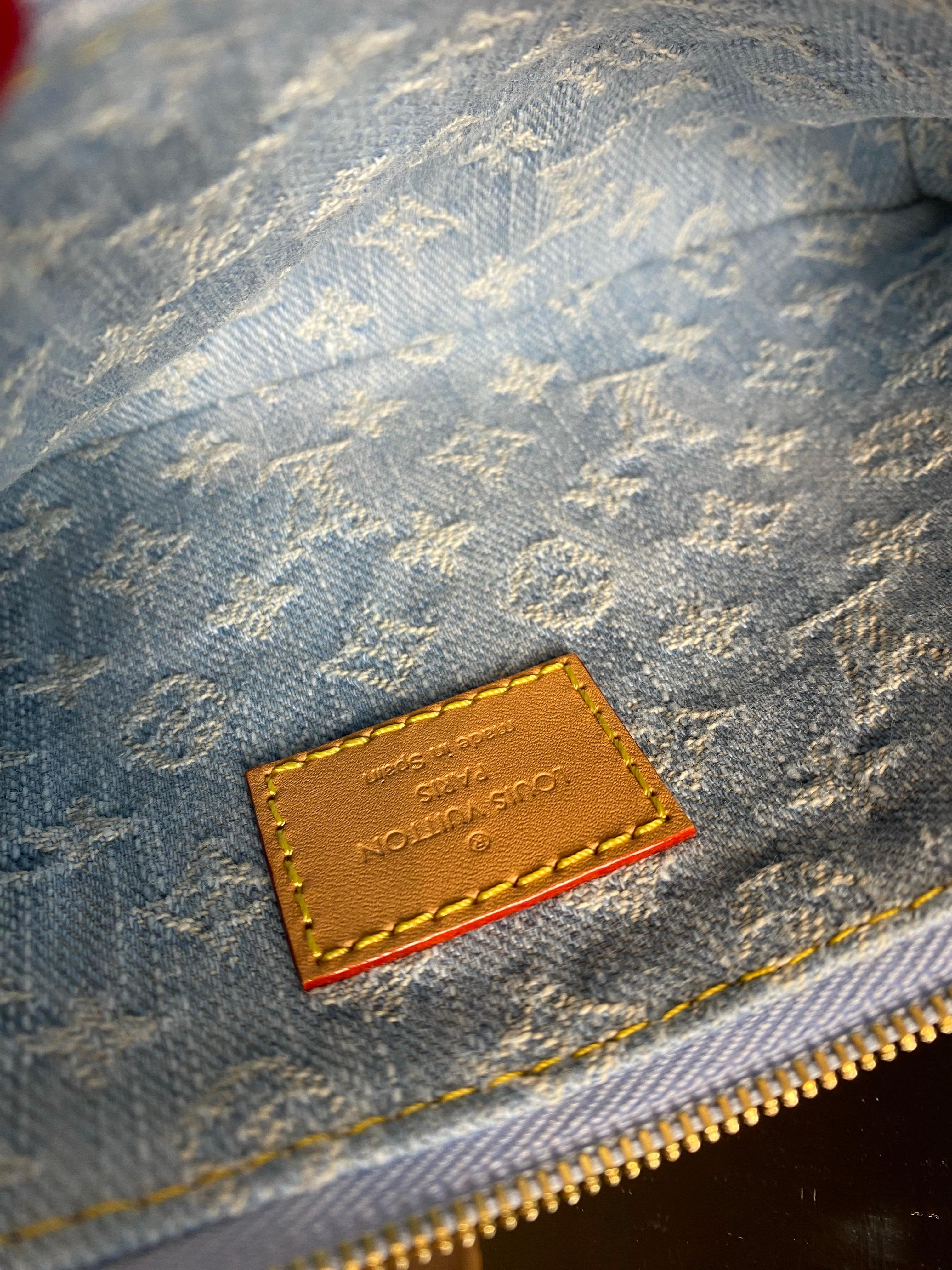 Louis Vuitton Liv Monogram Denim clutch Bag 2