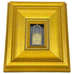 Louis Vuitton Lock and Key Art in Gold Framed Art