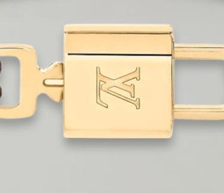 Shop Louis Vuitton LOCKIT LV LOCK IT AGAIN BRACELET Gold-color Monogram  M8015F by Belleplume