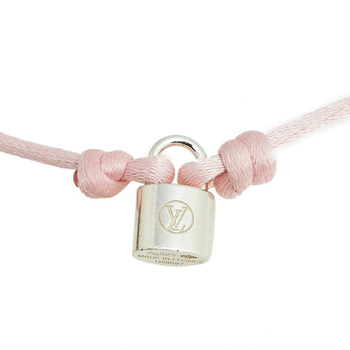 Louis Vuitton Empreinte 18 Karat White Gold Charm Bracelet with Pink Silk  Cord at 1stDibs