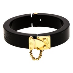 Louis Vuitton Lock Me Black Resin Gold Tone Hinged Bracelet