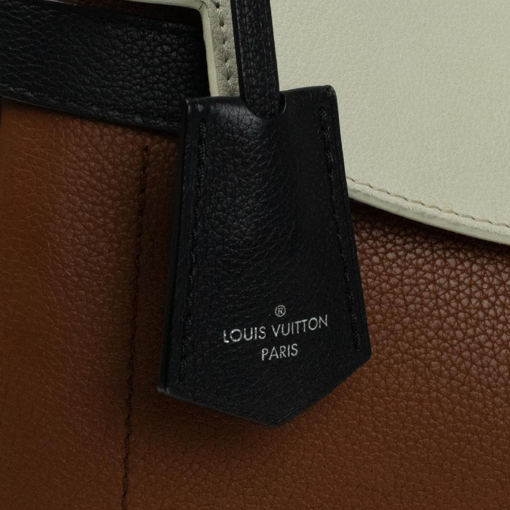 LOUIS VUITTON, Lock Me Ever in brown leather 5