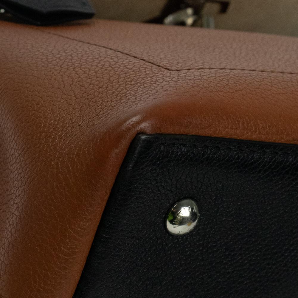 LOUIS VUITTON, Lock Me Ever in brown leather 6
