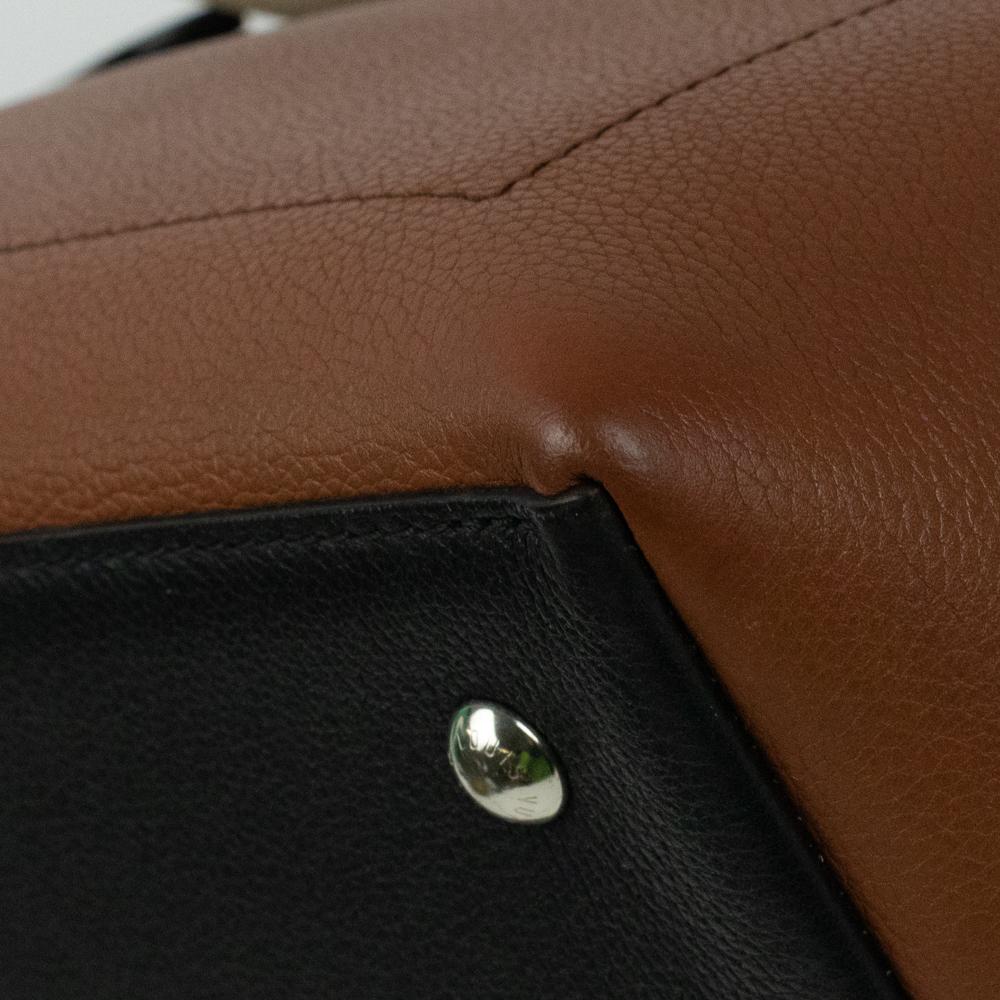 LOUIS VUITTON, Lock Me Ever in brown leather 7