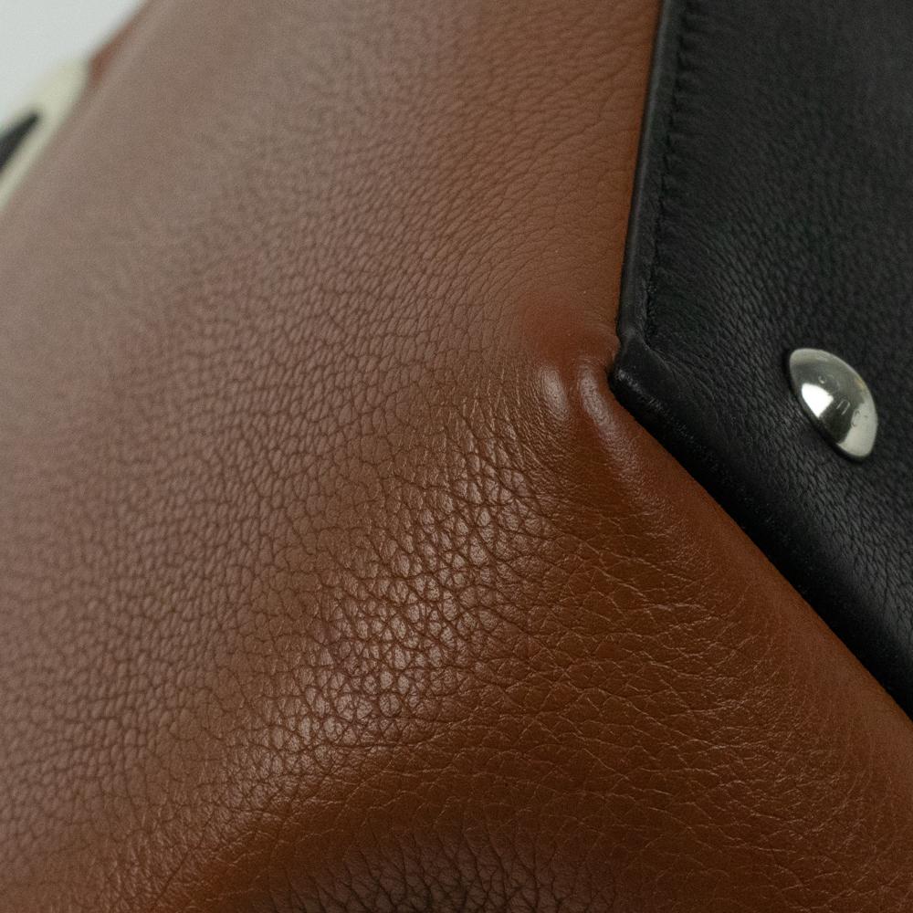 LOUIS VUITTON, Lock Me Ever in brown leather 8