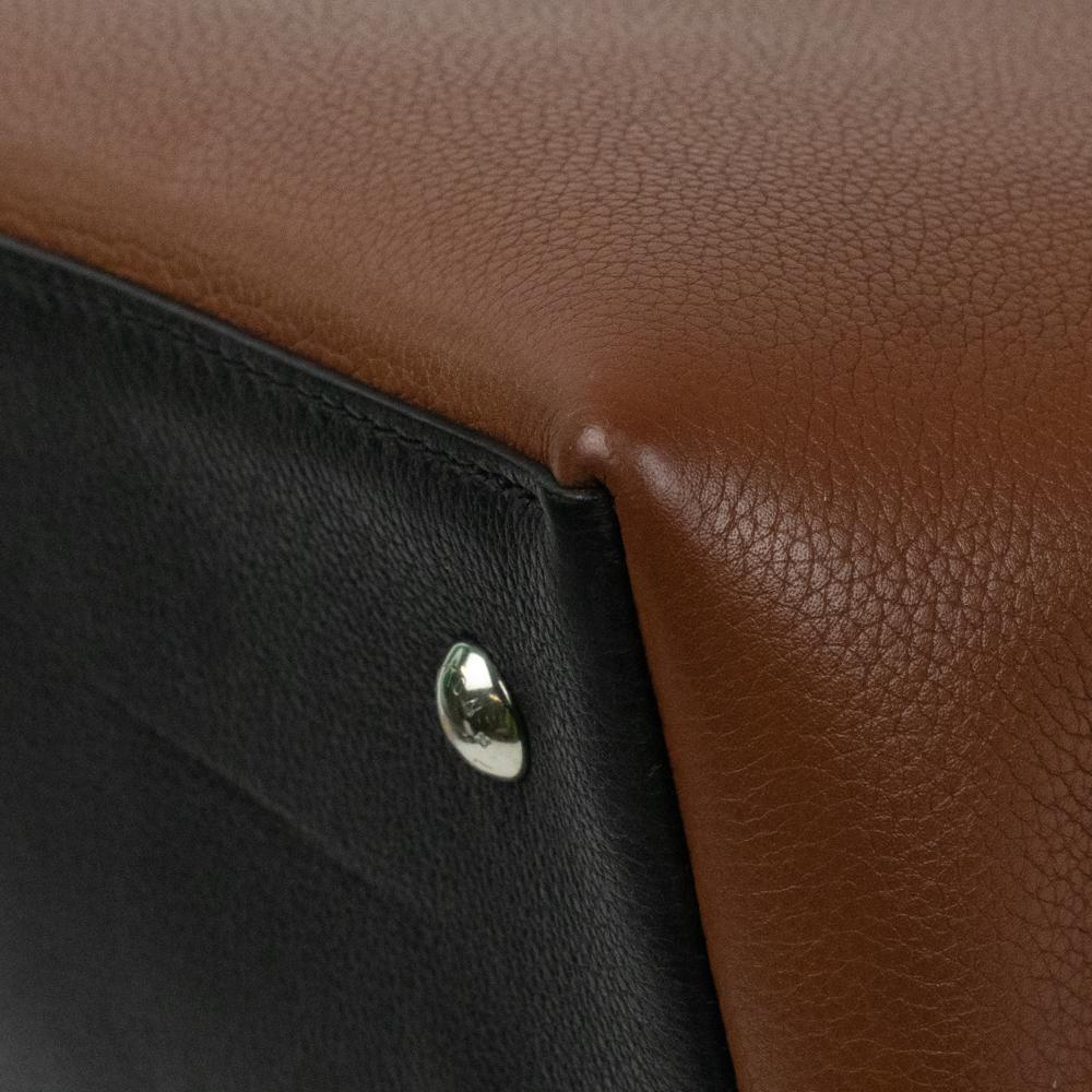 LOUIS VUITTON, Lock Me Ever in brown leather 9