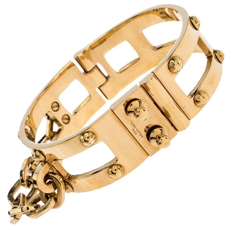 Louis Vuitton Lock Me Frame Gold Tone Cuff Bracelet at 1stDibs  locking cuff  bracelet, louis vuitton lock me bracelet, louis vuitton bracelet with lock