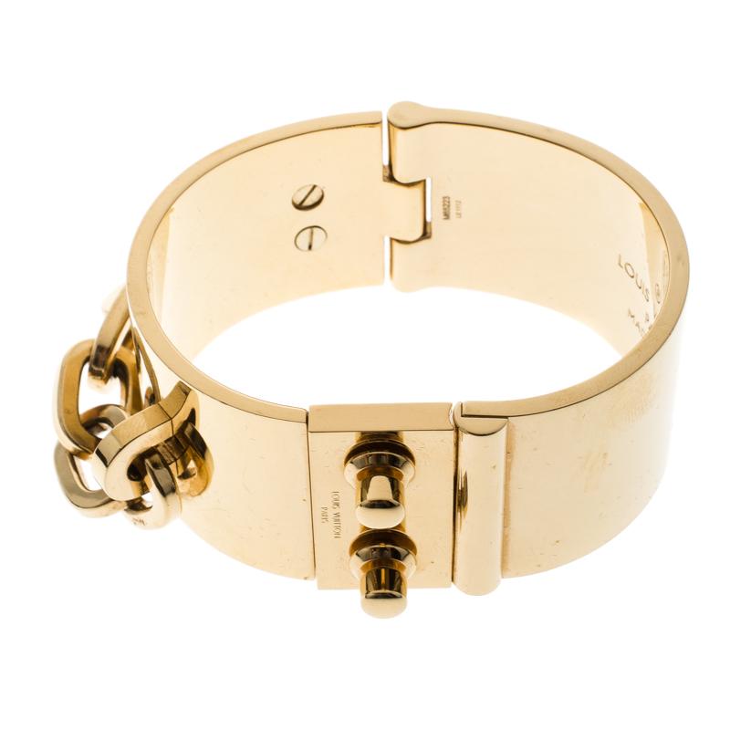 Louis Vuitton Lock Me Manchette Gold Tone Wide Cuff Bracelet In Good Condition In Dubai, Al Qouz 2