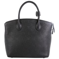 Louis Vuitton Lockit Handbag Monogram Revelation
