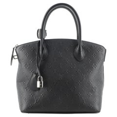 Louis Vuitton Lockit Handbag Monogram Revelation