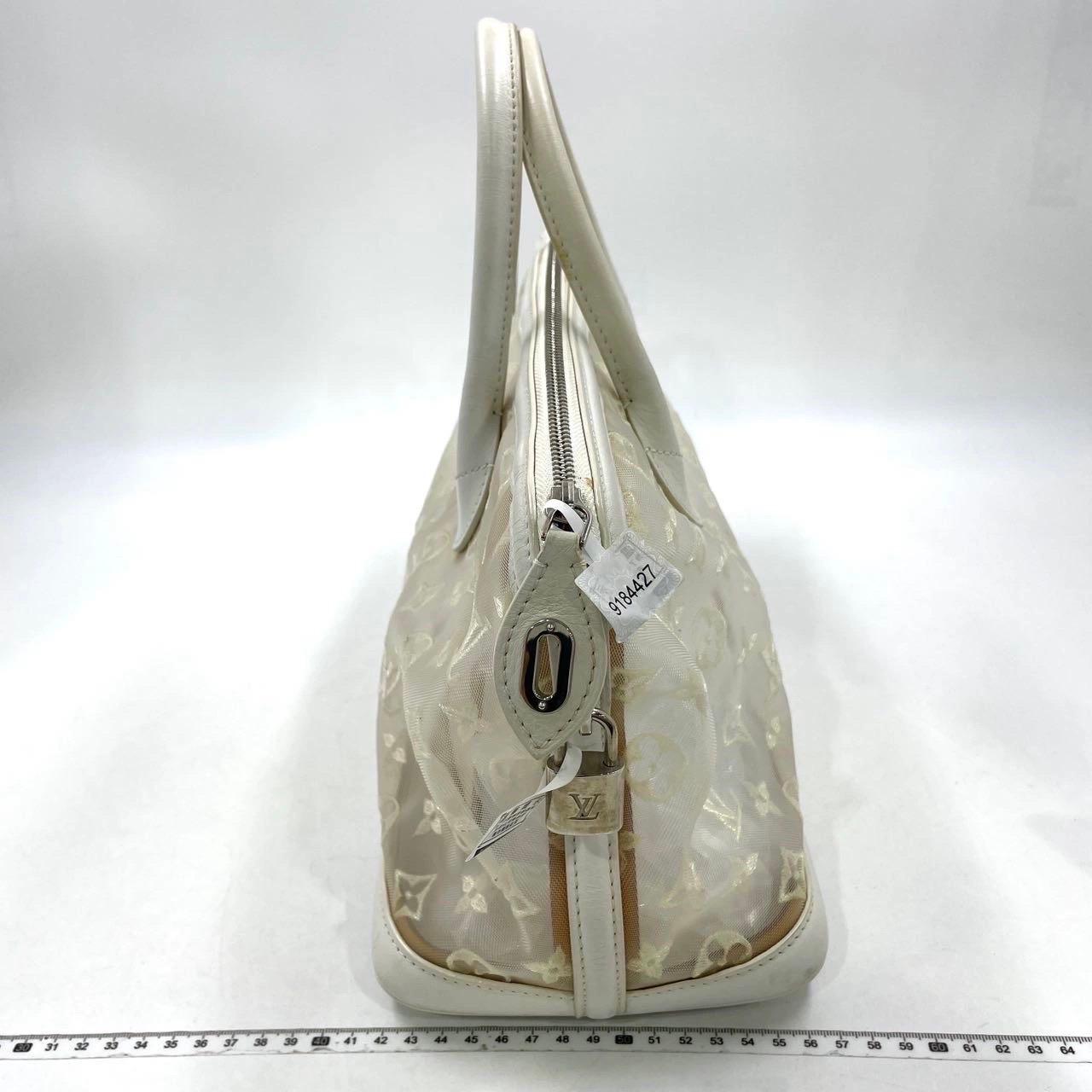 Sac à main en cuir et monogramme en maille blanche Louis Vuitton Whiting Pour femmes en vente