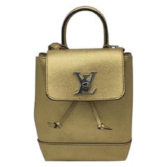 Louis Vuitton - Sac à dos Lockme en cuir doré