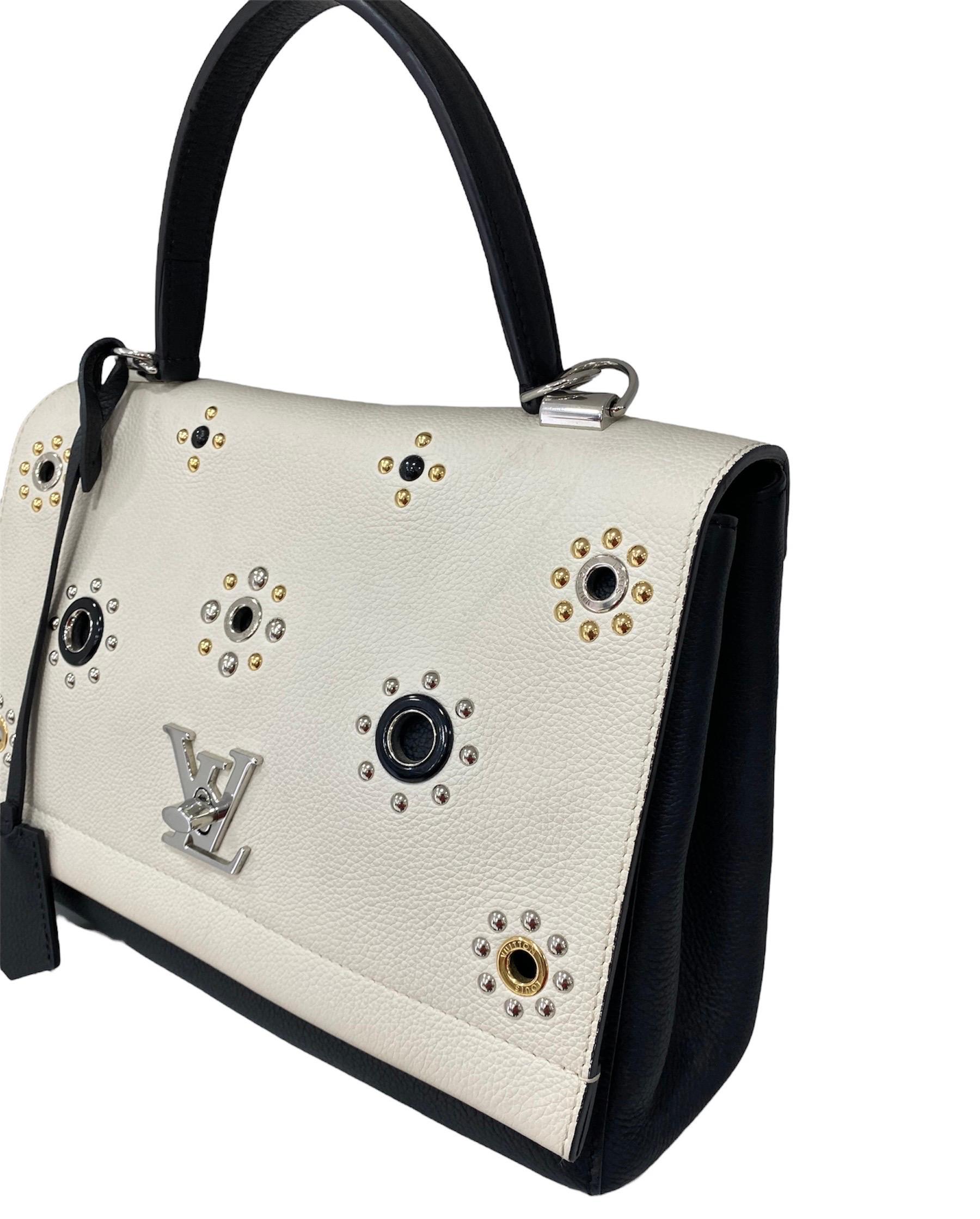 Beige Louis Vuitton Lockme Bicor Noir Blanc en vente