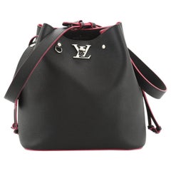 Louis Vuitton Blue Lockme Braided Bucket Bag Dark blue Leather Pony-style  calfskin ref.807651 - Joli Closet