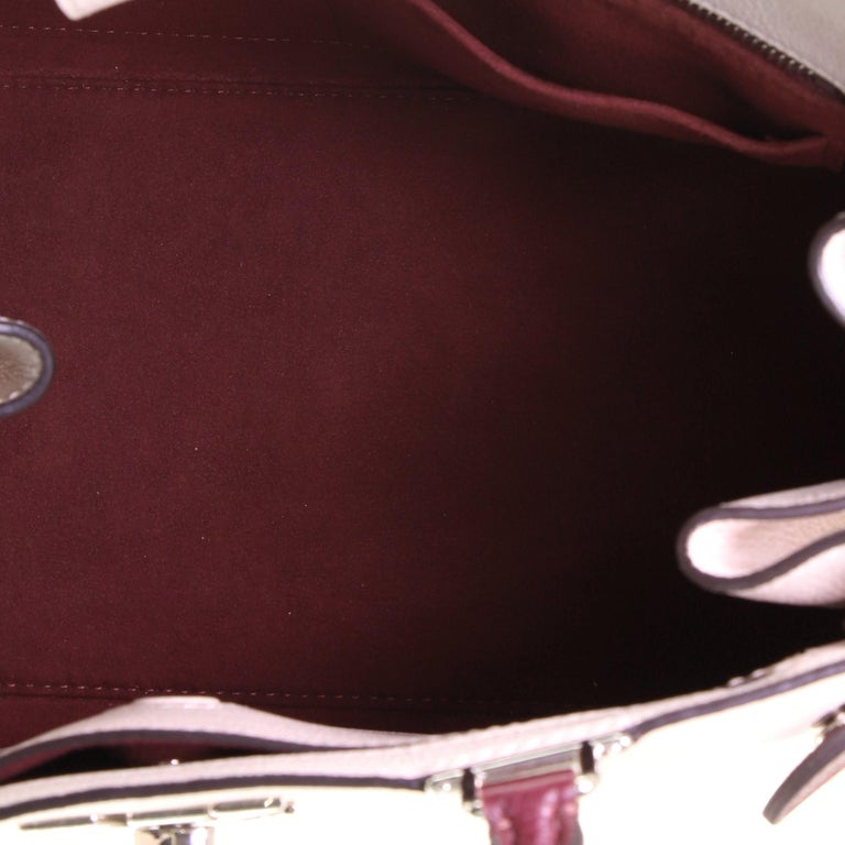Louis Vuitton Lock-me day handbag
