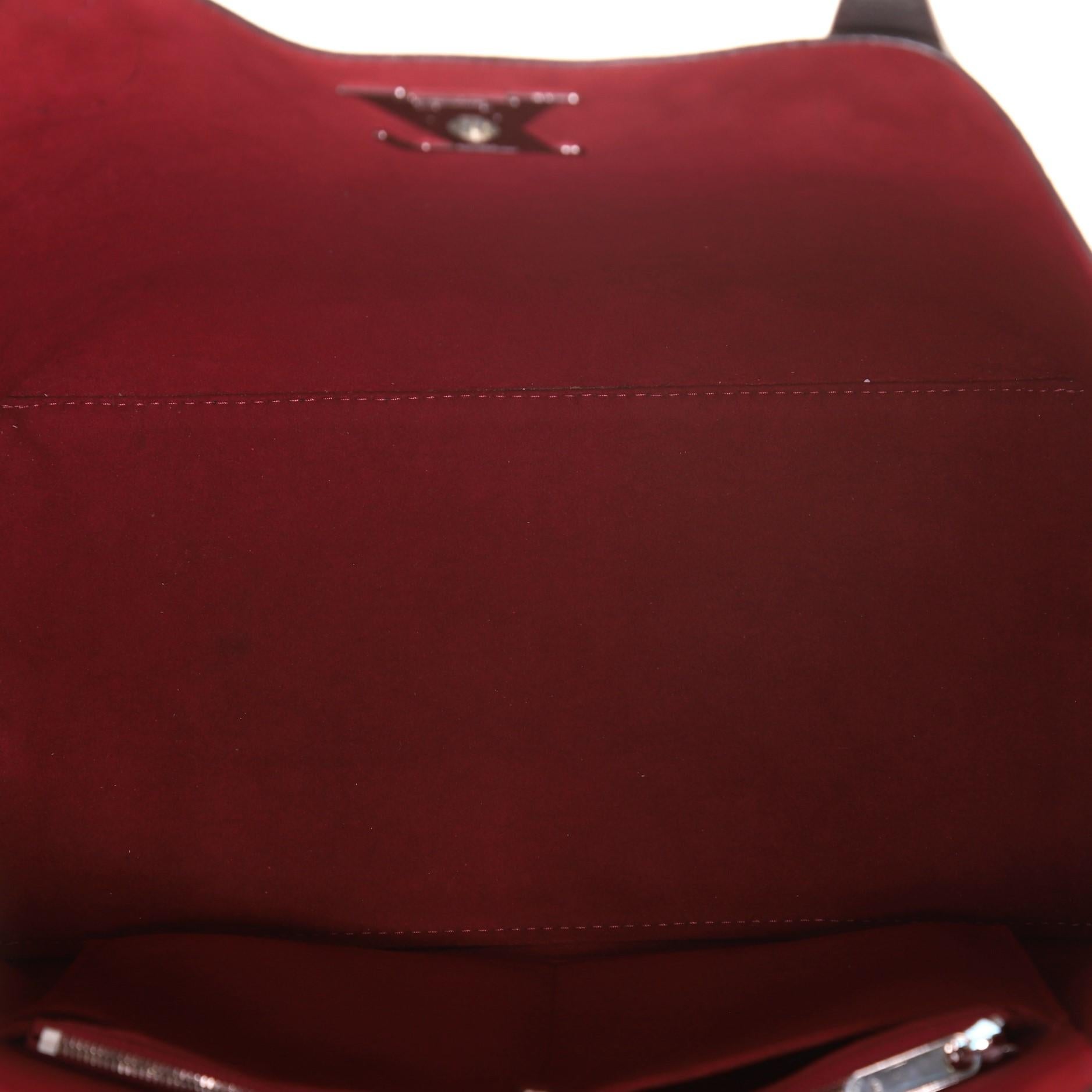 Louis Vuitton Lockme Go Tragetasche aus Leder für Damen oder Herren