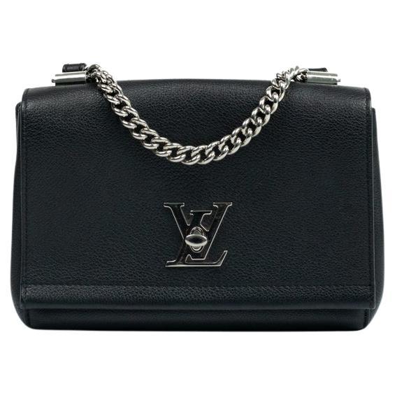 LOUIS VUITTON, Lockme in black leather For Sale
