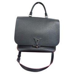 Louis Vuitton - Sac à main Lockme en cuir bleu