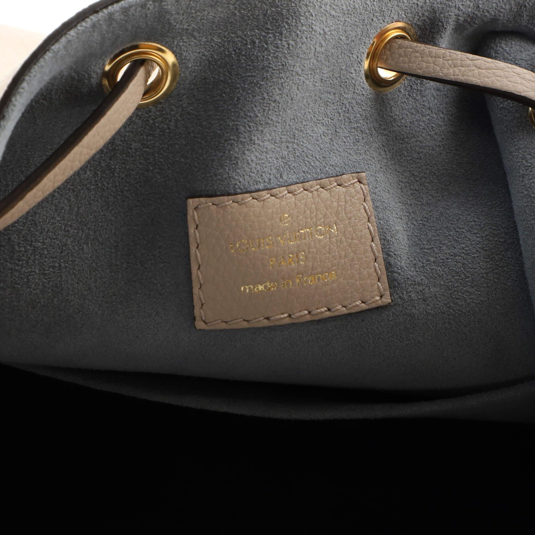 Louis Vuitton Lockme Pocket Bucket Bag Leather 1